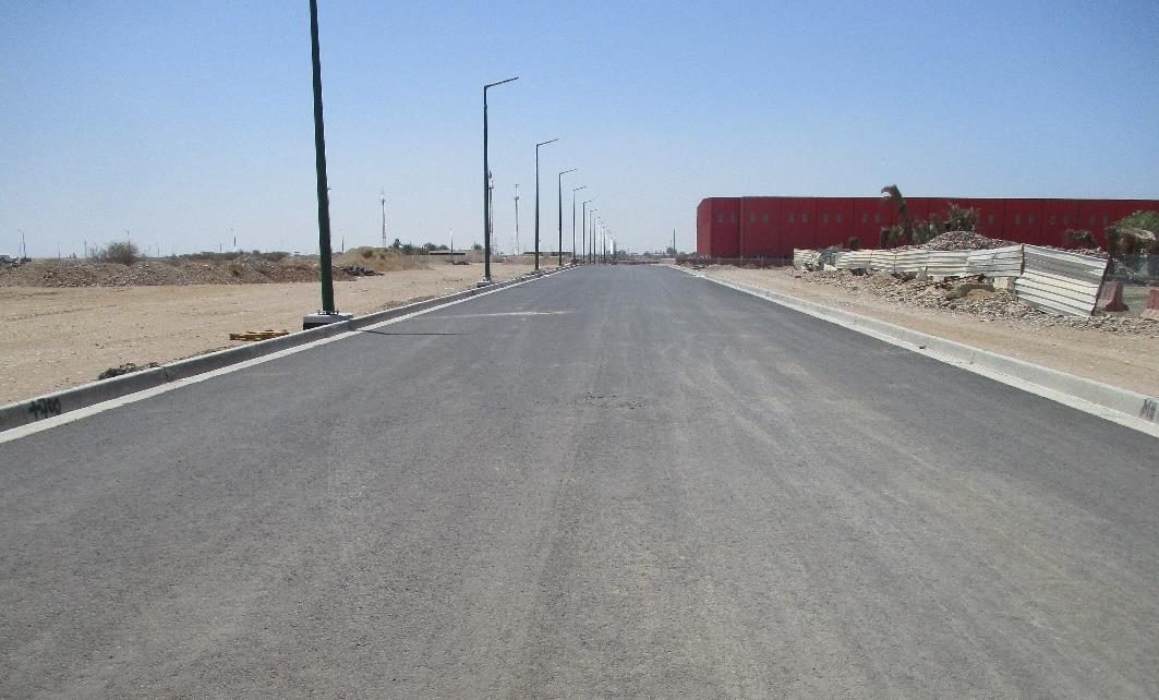 Industrial road completed with curb and gutter